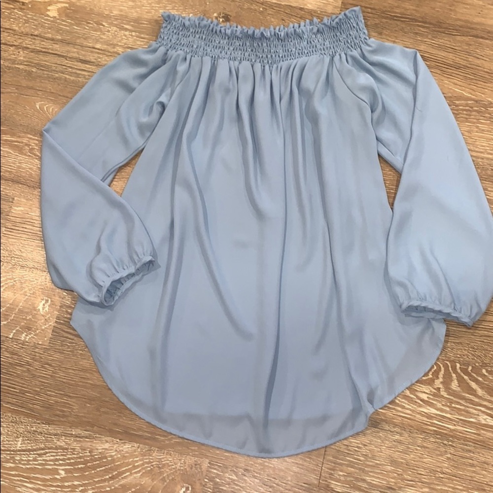 Fantastic Fawn baby blue off the shoulder blouse